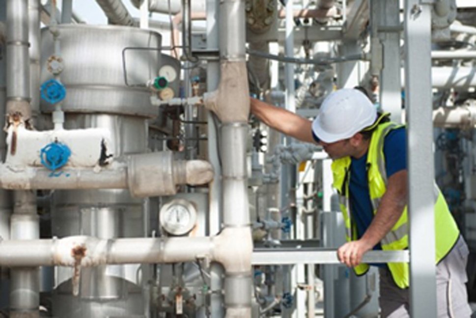 Oxar technician at industrial gas plant